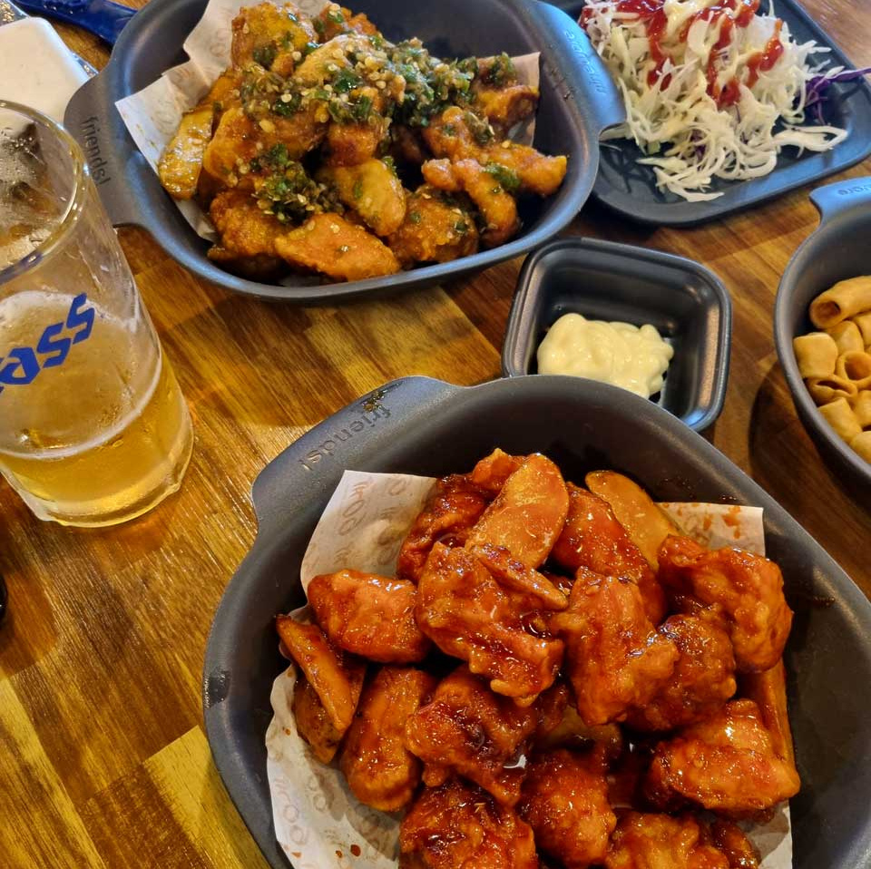 Spicy Korean Fried Chicken with Cass beer, South Korea