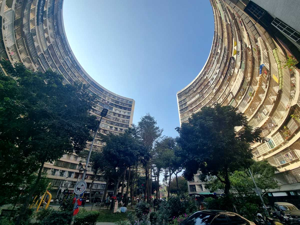 Oval shaped apartment blocks in Guomao military village, Kaohsiung