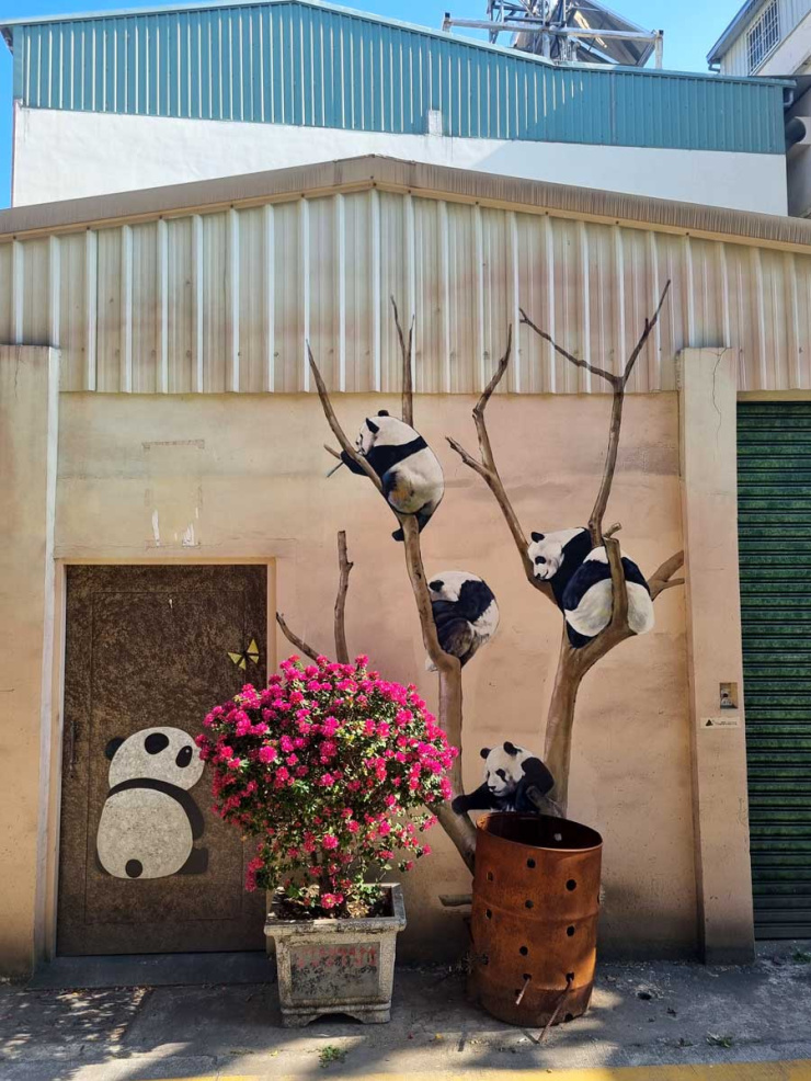 Panda art murals and flowers in Neiwei Village, Kaohsiung, Taiwan