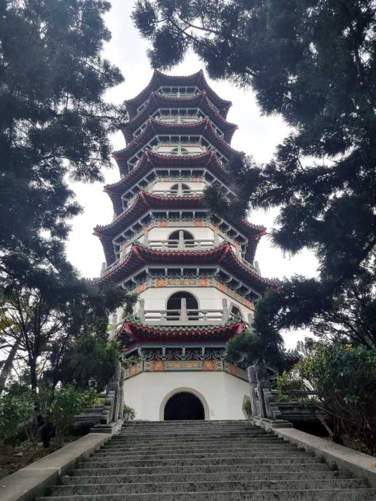 Zhongxing Tower pagoda surrounded by trees near Chengcing Lake, Kaohsiung